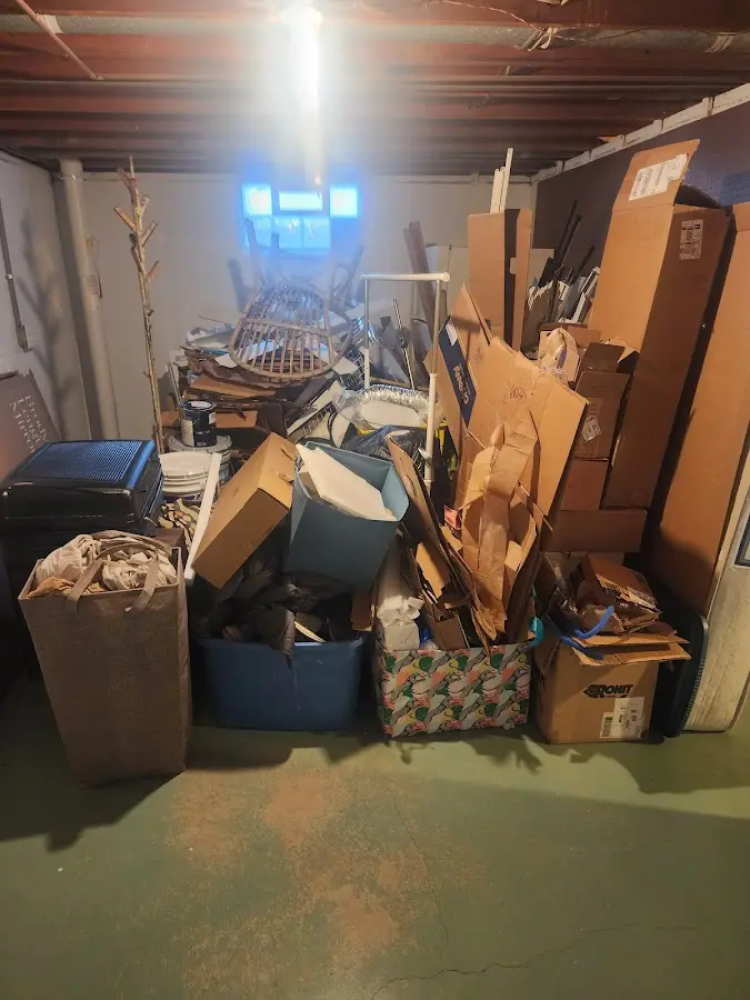 Roll-off dumpster container at job site for 15 Yard Dumpster Rental in Lima